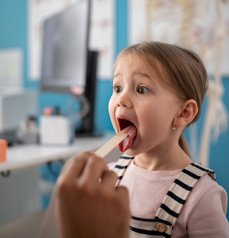 young-male-doctor-checking-little-girl-39-s-throa-2024-10-21-21-31-07-utc